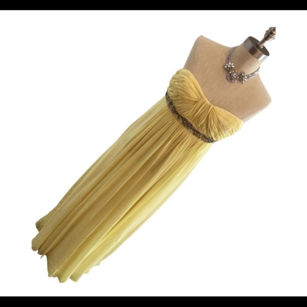 Strapless light yellow evening gown